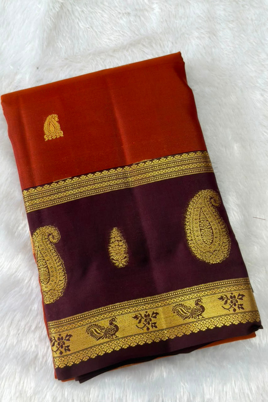 Rust Orange Silk Saree with Maroonish Brown Border & Gold Paisley Motifs