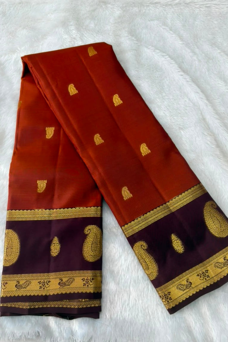 Rust Orange Silk Saree with Maroonish Brown Border & Gold Paisley Motifs