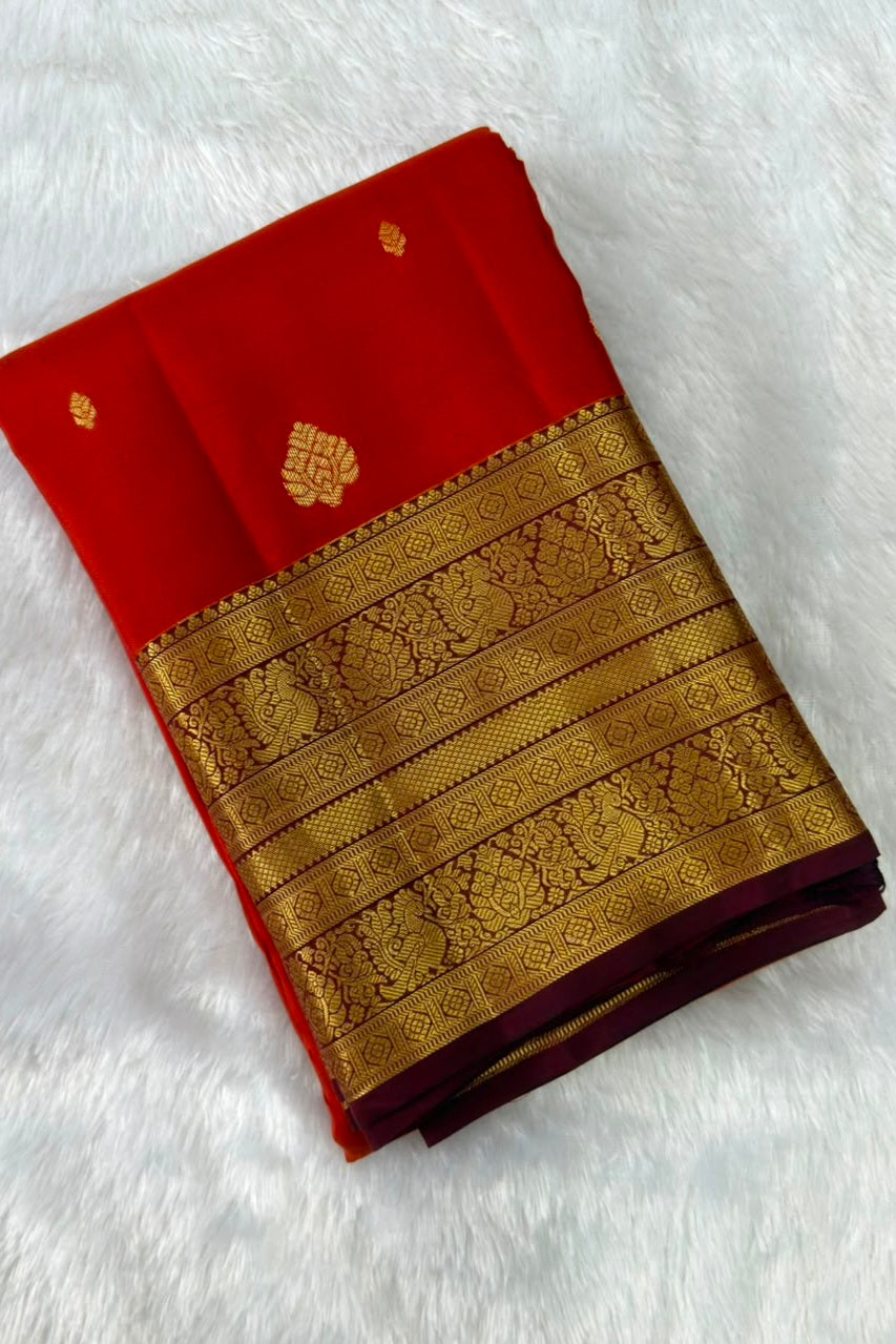 Rust Orange Pure Silk Saree with Gold Peacock Zari Border and Butis