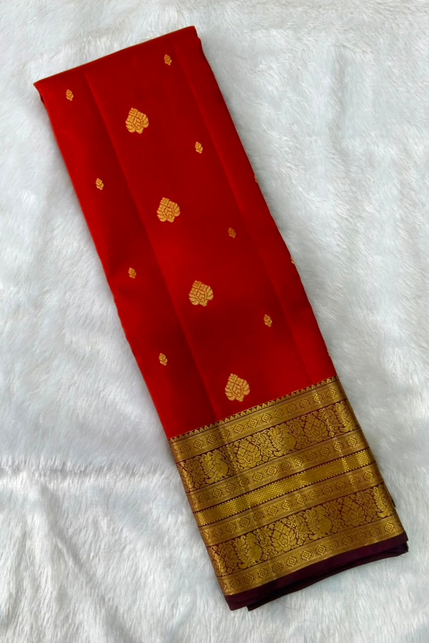 Rust Orange Pure Silk Saree with Gold Peacock Zari Border and Butis