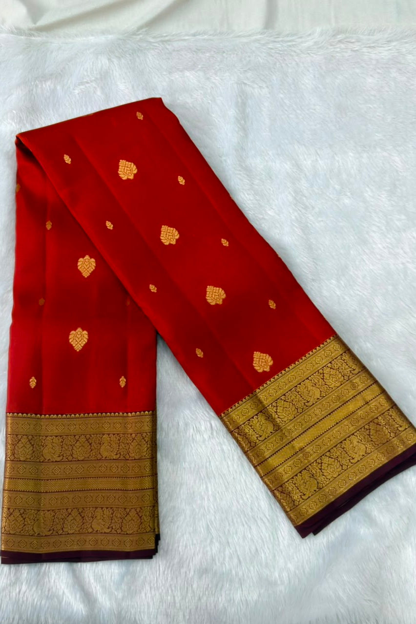 Rust Orange Pure Silk Saree with Gold Peacock Zari Border and Butis