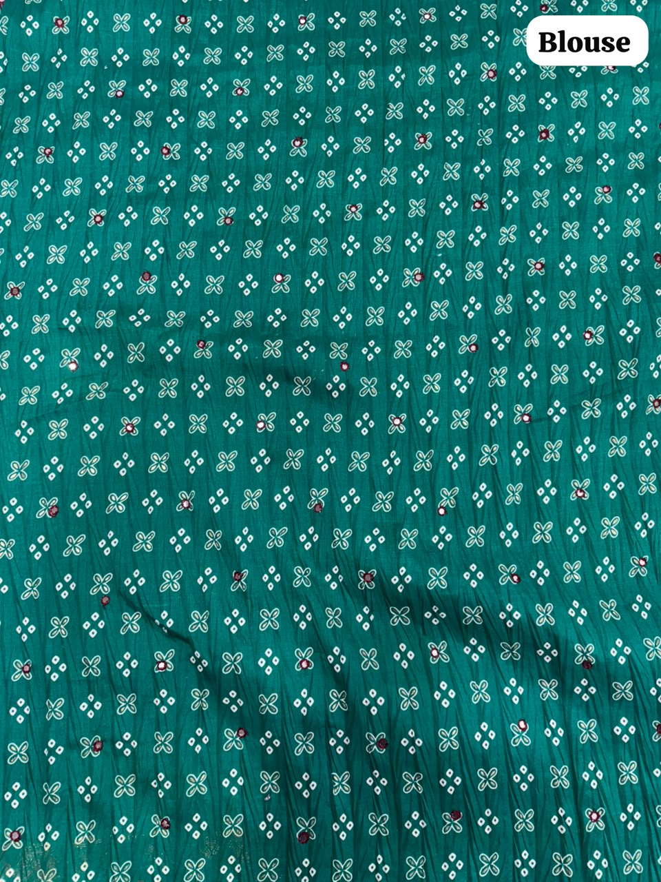 Crushed rich wine-maroon saree with a peacock green pallu Bandani Silk Saree with Mirror Work