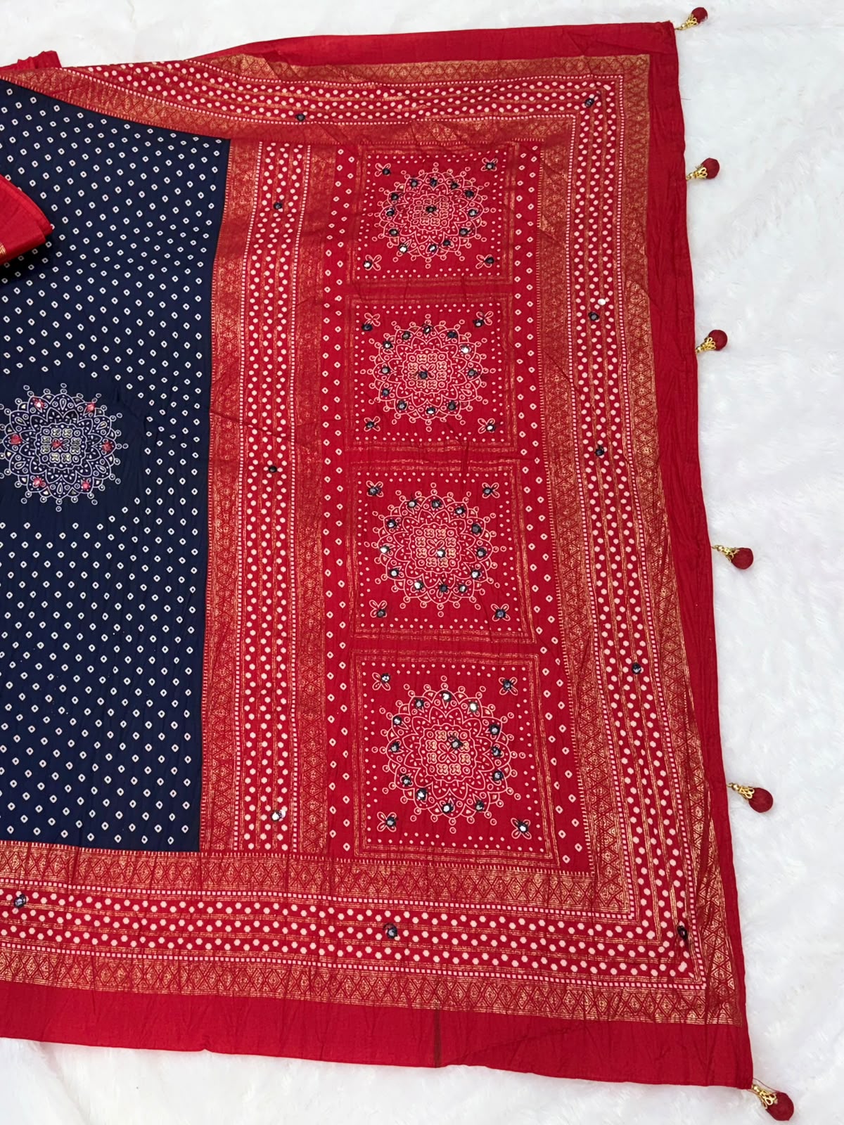 Crushed rich navy blue and rust red palette Bandani Silk Saree with Mirror Work