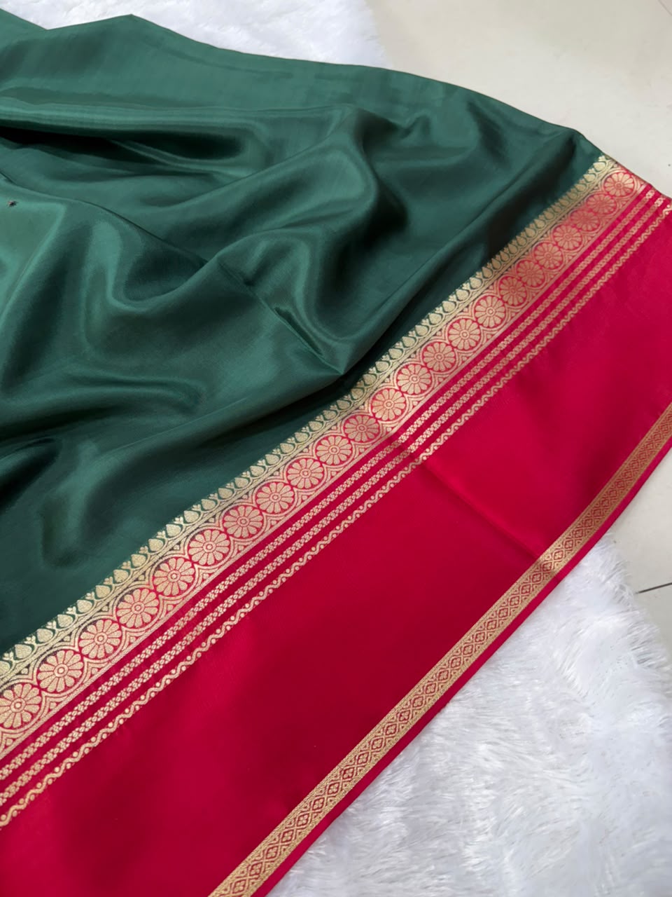 Emerald Green & Crimson Red Floral Zari Semi-Crepe Saree