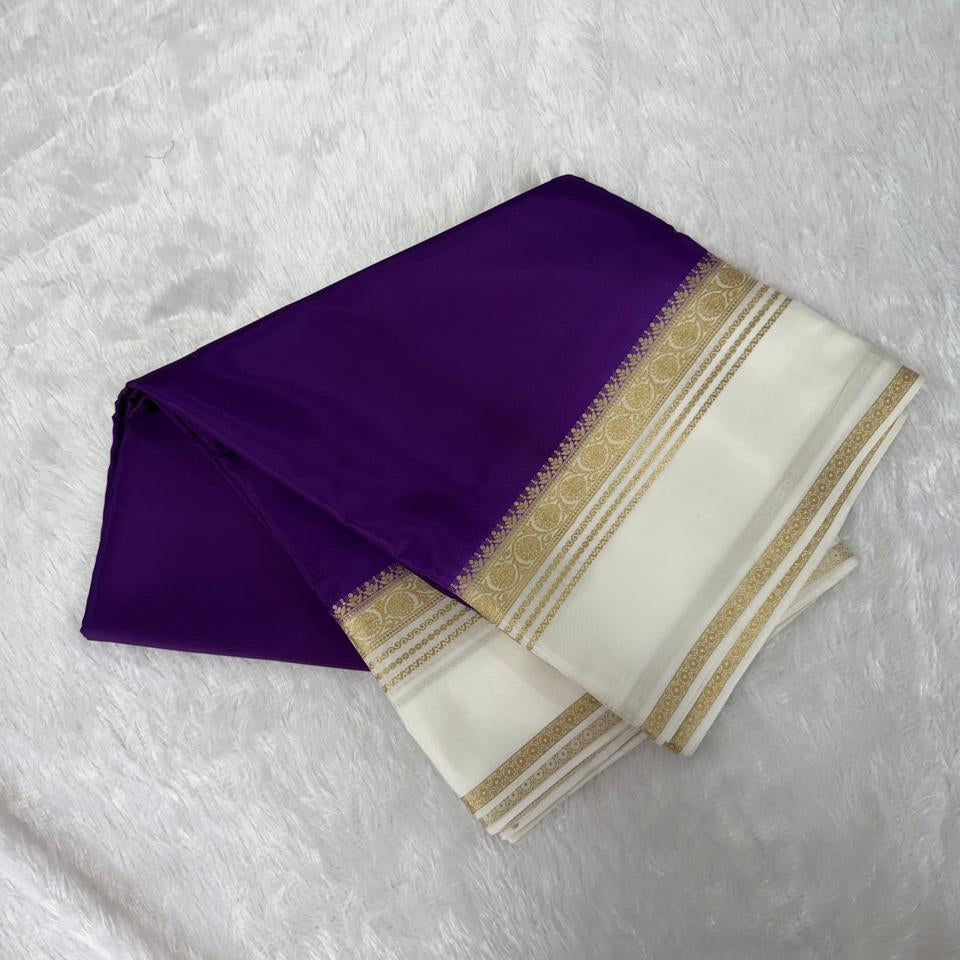 Vibrant Purple & White Gold Zari Semi-Premium Crepe Saree