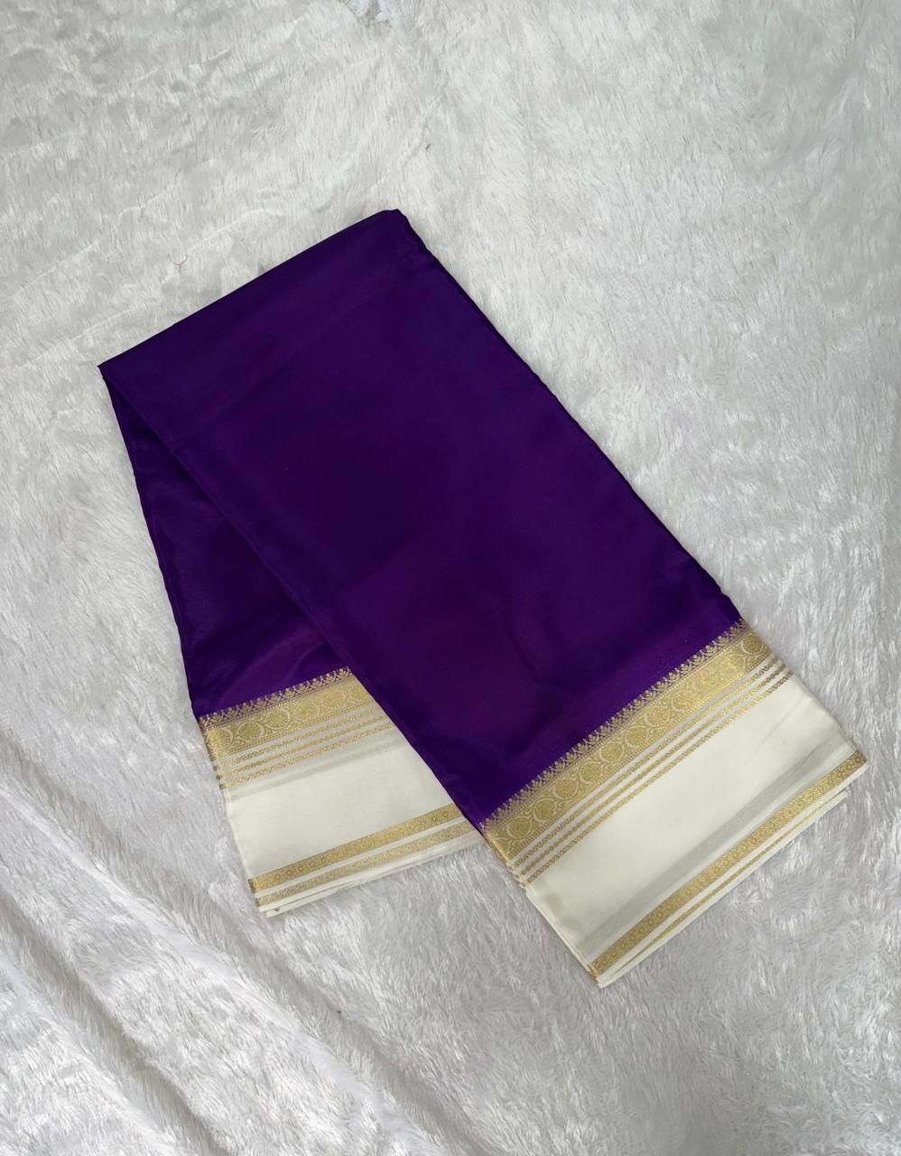 Vibrant Purple & White Gold Zari Semi-Premium Crepe Saree