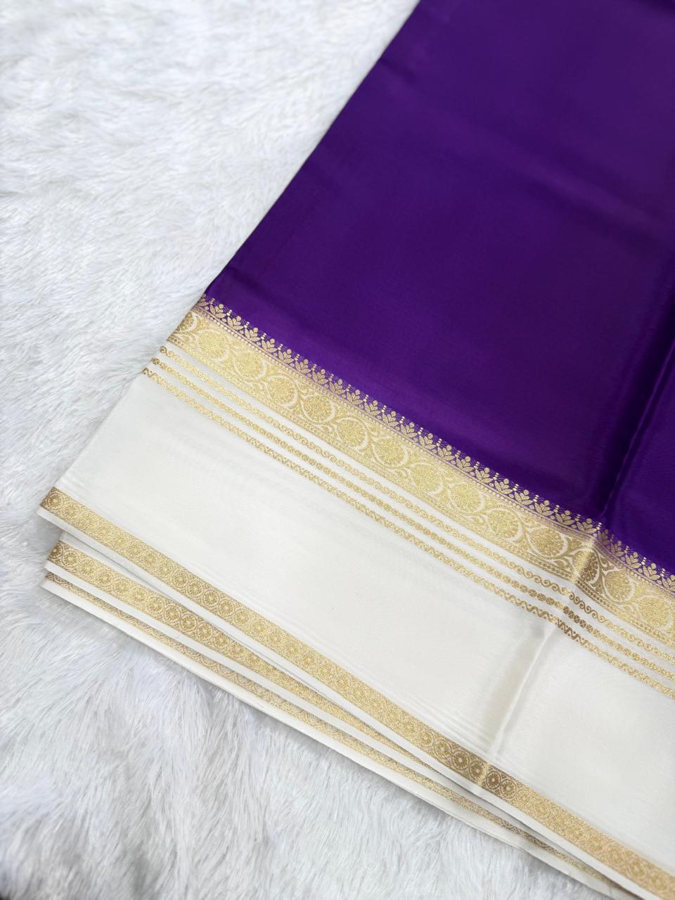 Vibrant Purple & White Gold Zari Semi-Premium Crepe Saree