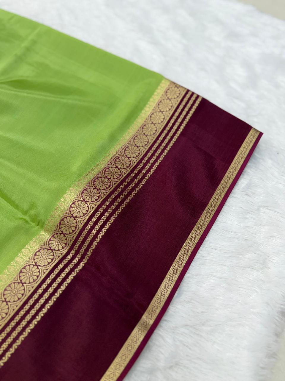Deep Parrot Green & Maroon Gold Zari Semi-Crepe Saree