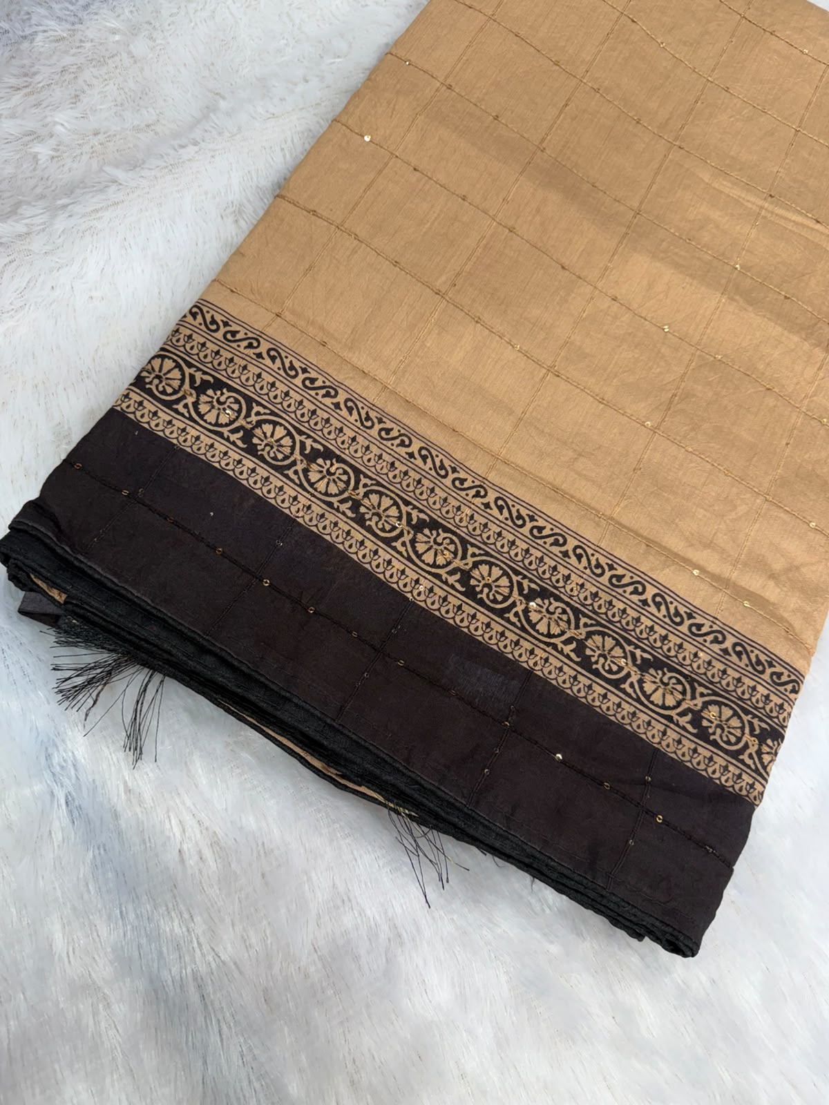 warm beige and classic black heritage mullcotton saree