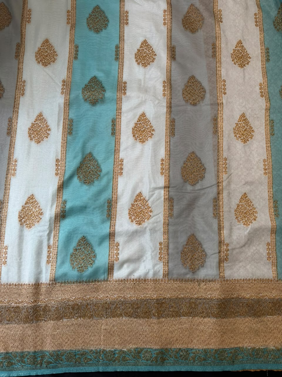 Turquoise Blue & Ivory Golden Zari Kaddi Georgette Saree