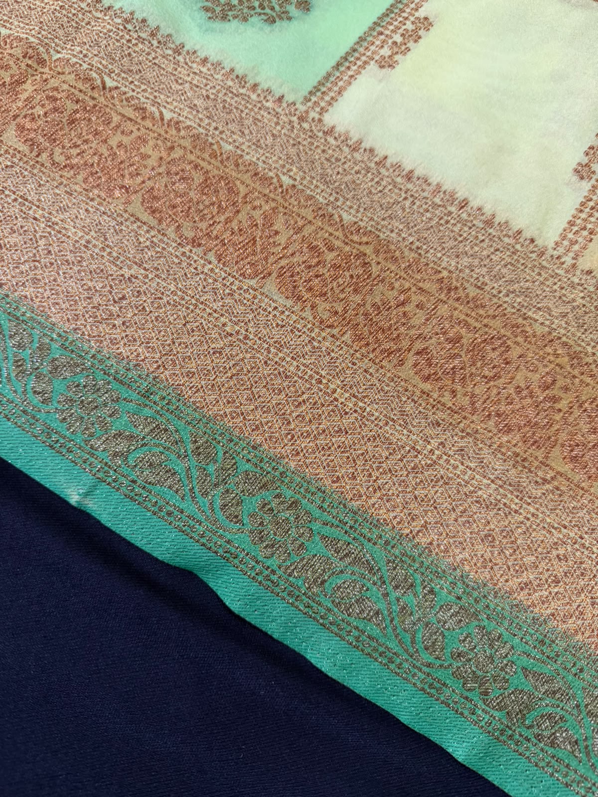 Ivory Cream, Pastel Cream & Golden Zari Kaddi Georgette Saree