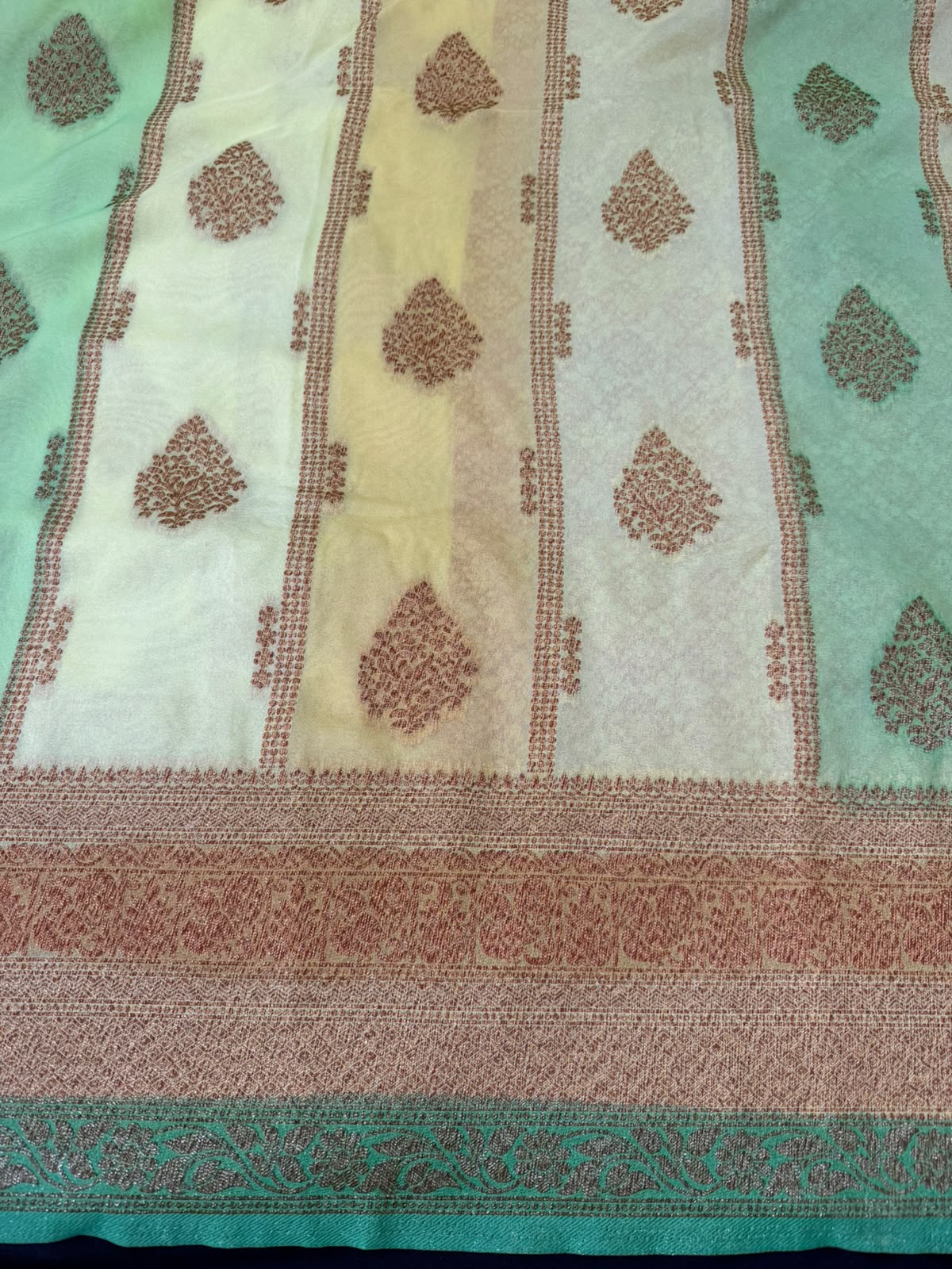 Ivory Cream, Pastel Cream & Golden Zari Kaddi Georgette Saree