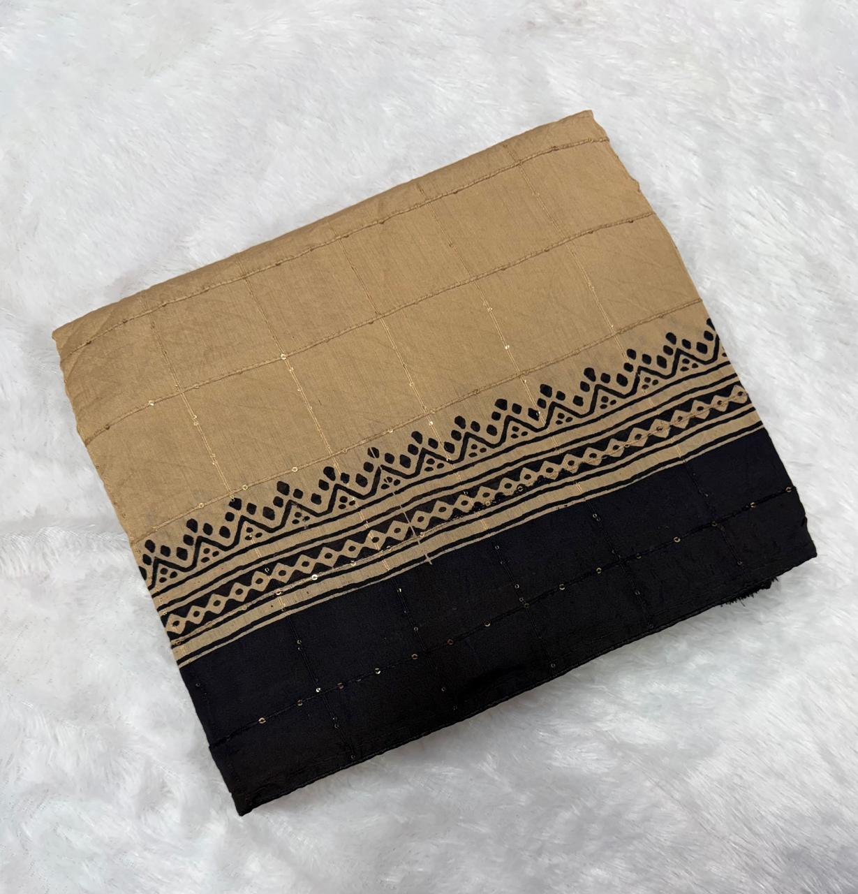 warm beige and classic black heritage mullcotton saree